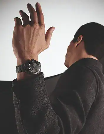 5. Men's watches 354 x 456 Man wearing a black Tudor watch on his wrist - Washington Watches