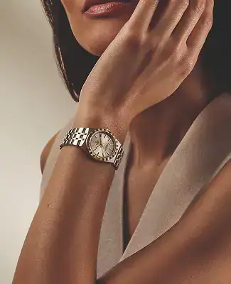 6. Women's watches 354 x 456 Woman wearing a Tudor watch with a silver bracelet - Washington Watches